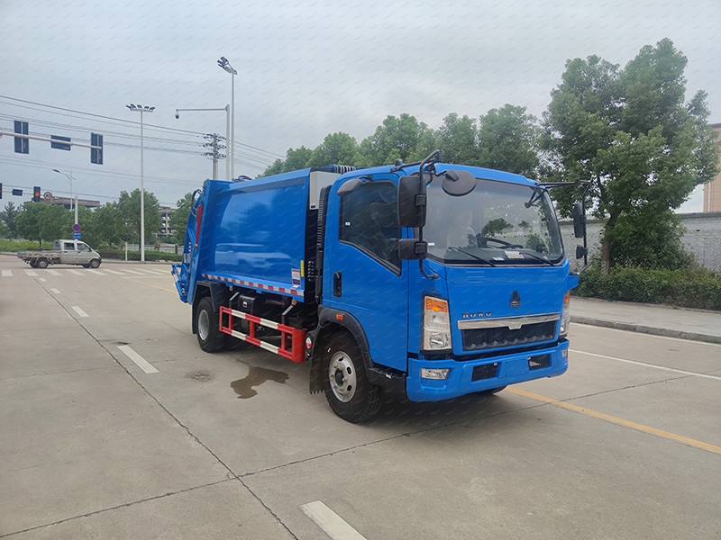 Camion compacteur howo 14m3 
